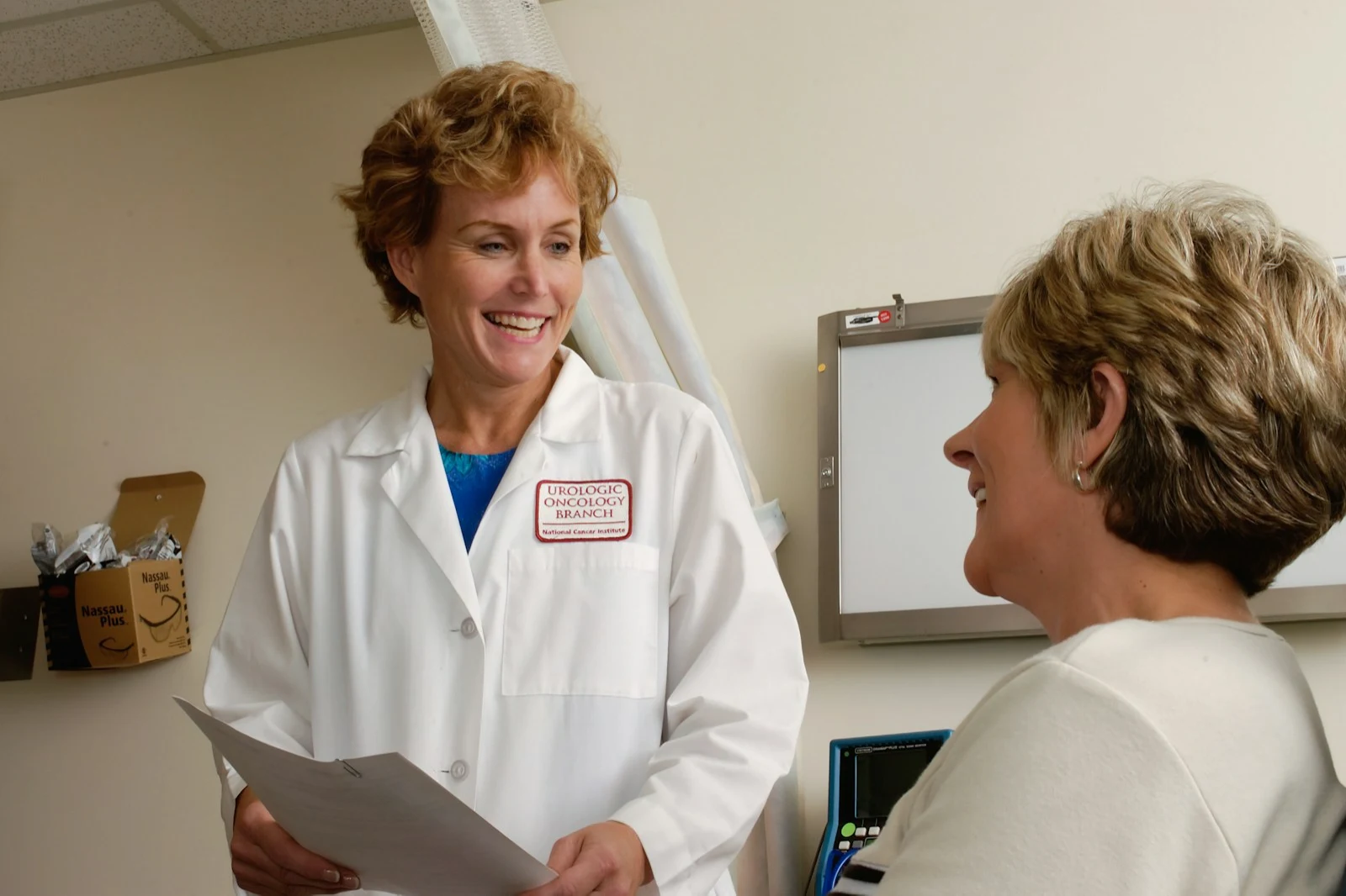 A clinician and patient reviewing medical information together